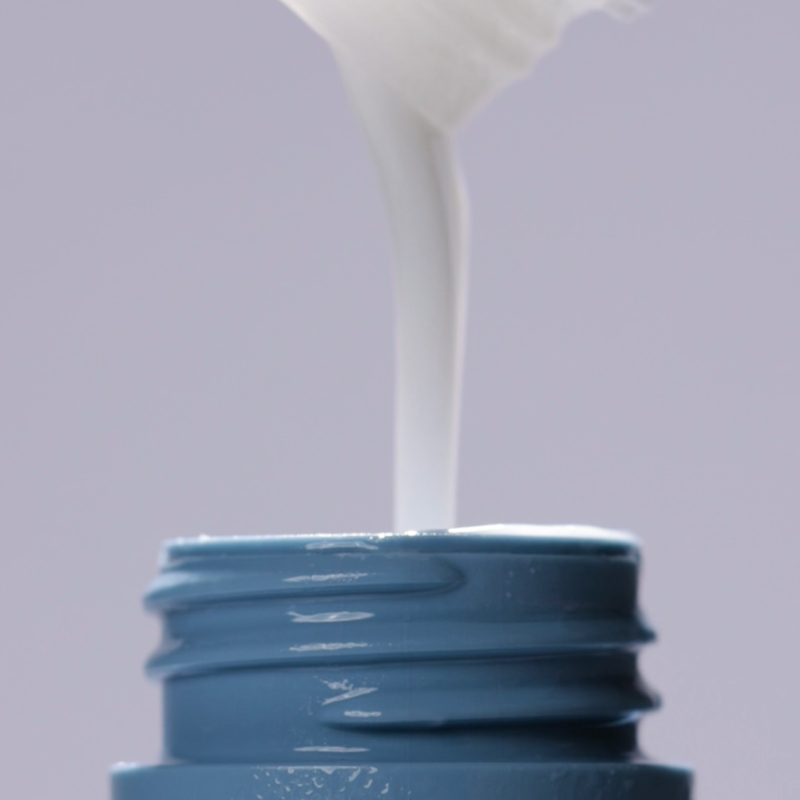 Australian best selling conditioner being poured into sustainable bottle