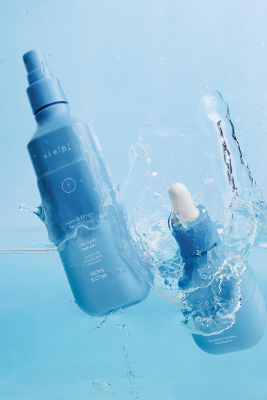 skelp! Healer Serum & skelp! Pre Cleaner dropping into water with big water splash.
