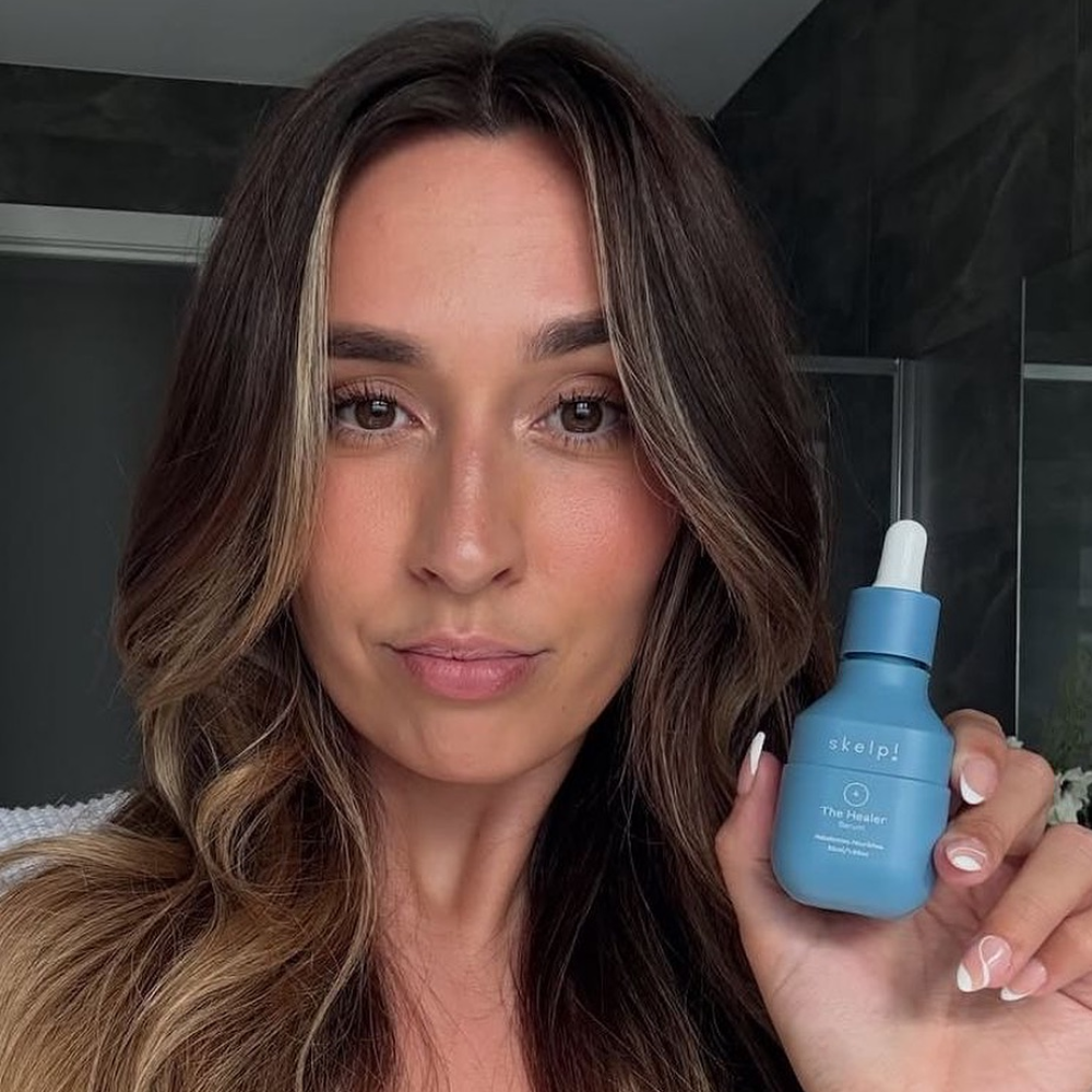 real user showing incredible healthy scalp and hair after using skelp serum