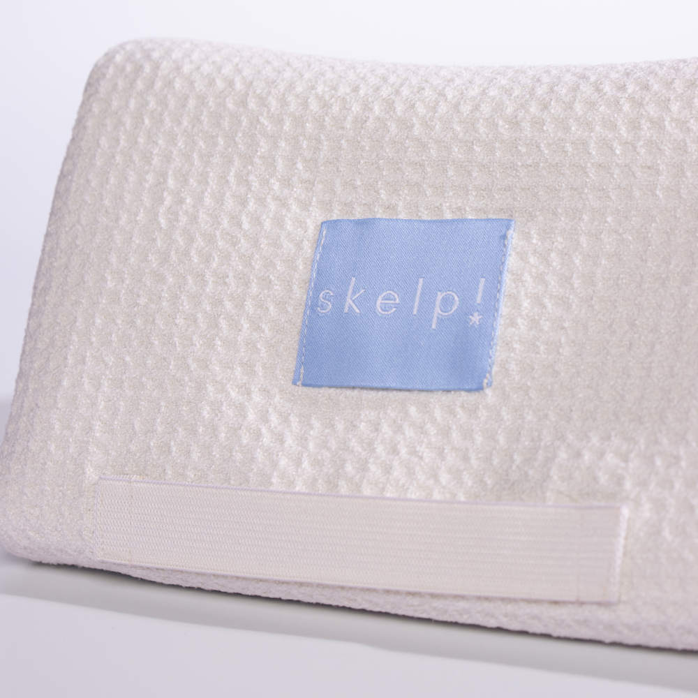 skelp Microfibre Towel neatly folded showing elastic band to hold towel in place.