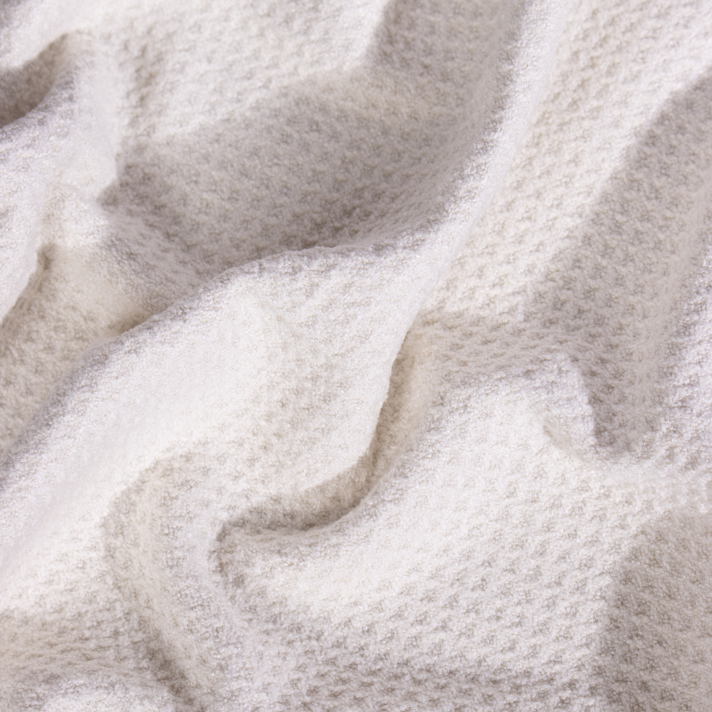 Close-up of textured beige fabric of the skelp! microfibre towel.