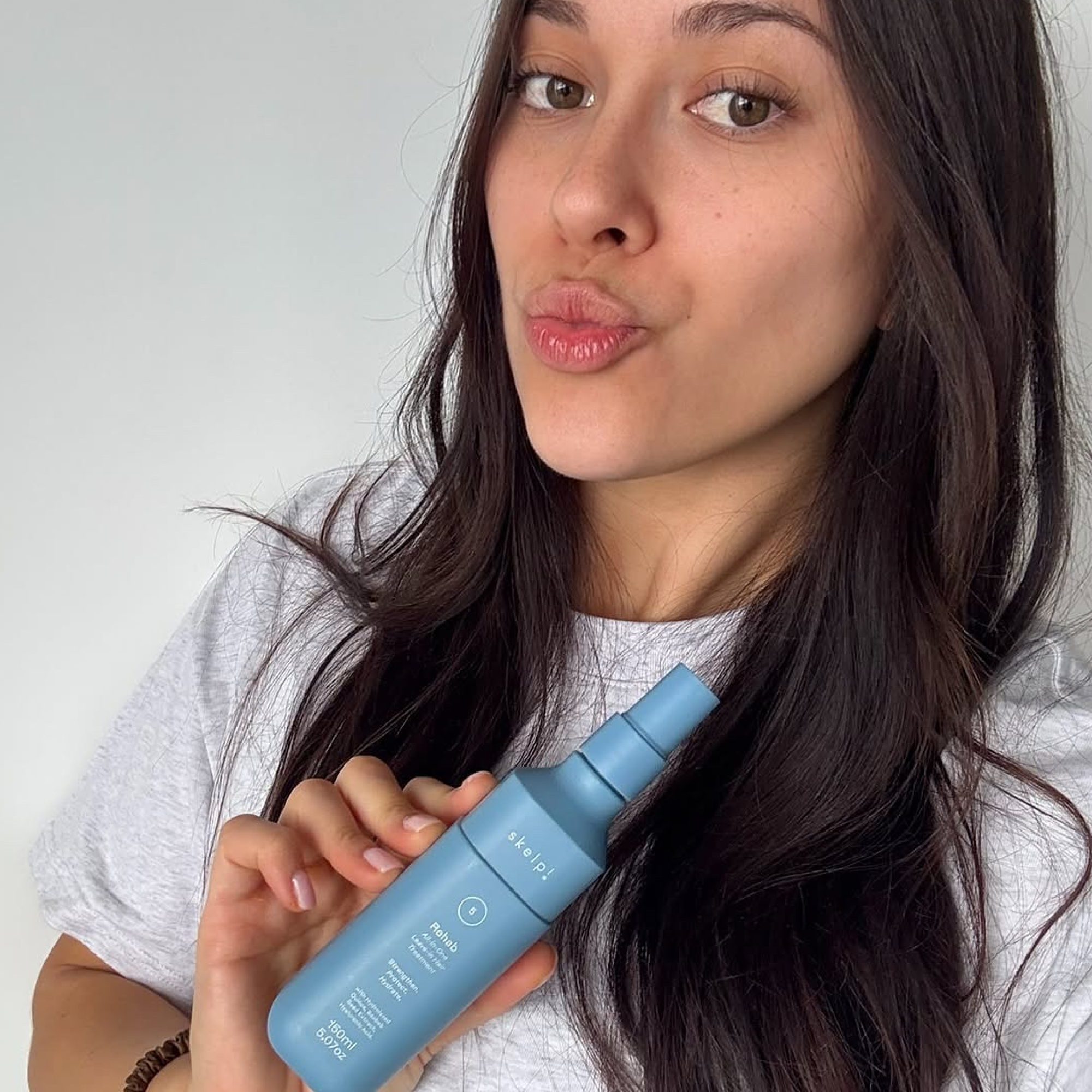 real skelp! haircare customer showing beautiful hair after using skelp rehab all in one leave in hair treatment