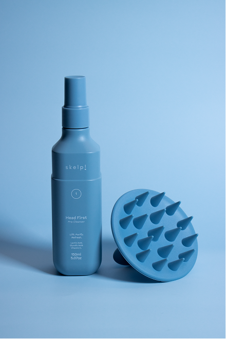 Image of two products pre cleanser and scalp brush used as a pre-treatment for healthier scalp