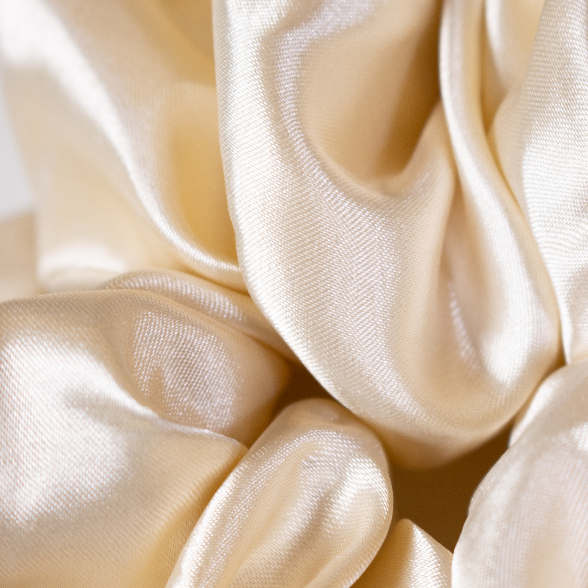 Close up of premium silk fabric from skelp! hair scrunchie.
