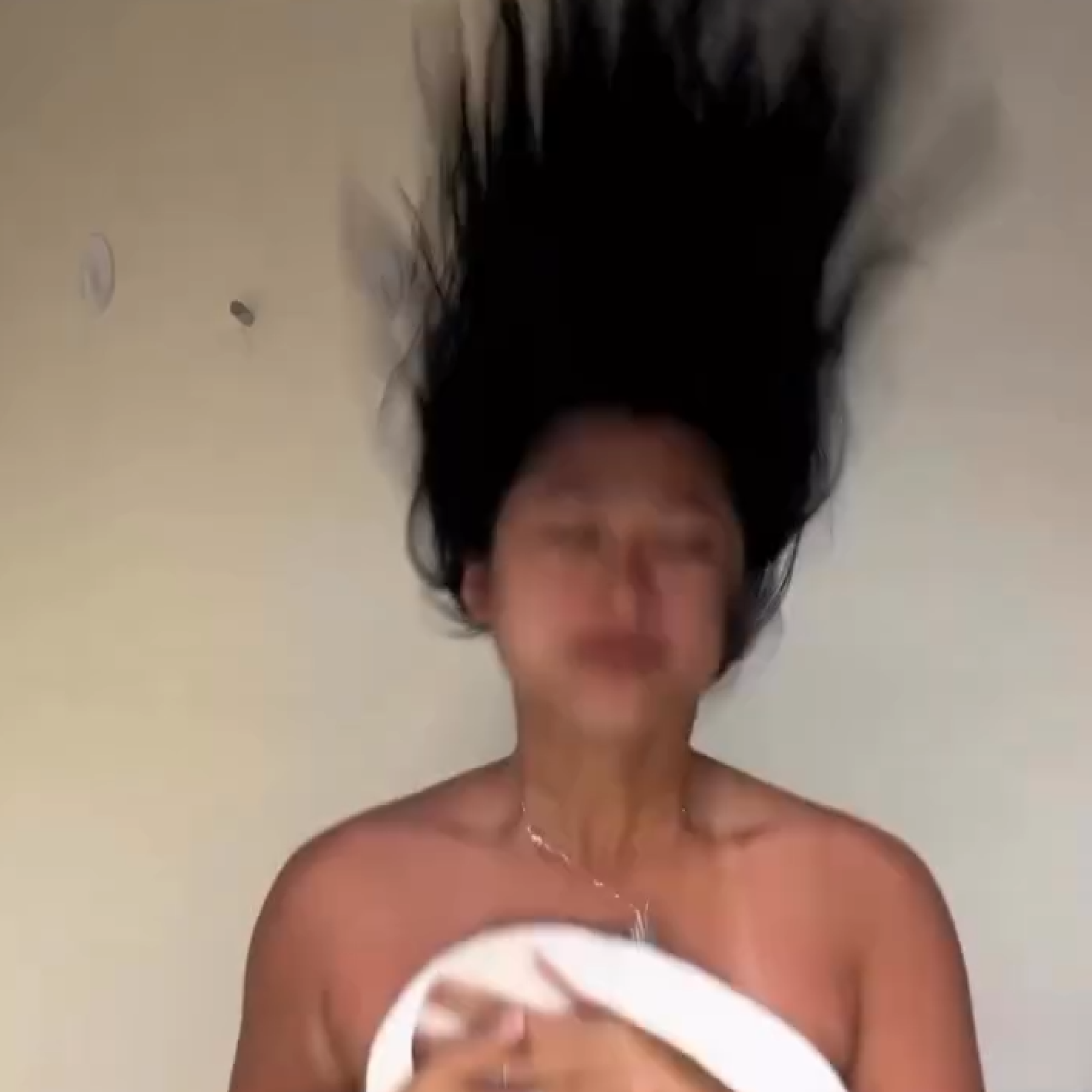 skelp consumer flicking hair after hair drying. soft beautiful hair.