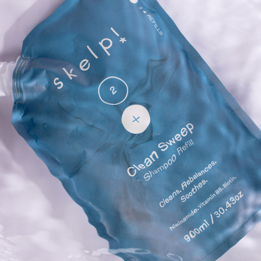 Skelp eco-friendly refillable shampoo pouch on water surface for hair care