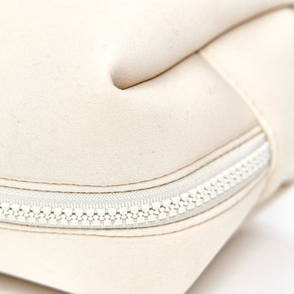 Close-up of a beige cosmetic bag with premium zipper for travel and storage