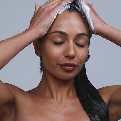 skelp! model applying Stay Hydrated Moisture Mask