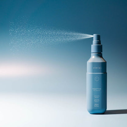 skelp! best seller Head First Pre Cleanser - blue background mist spraying